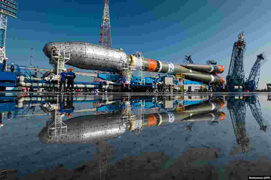 A Soyuz-2.1b rocket booster with British OneWeb satellites aboard is seen at a launchpad at the Vostochny cosmodrome outside the Russian city of Uglegorsk.