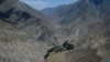 Mud from a landslide caused by flooding Baghlan province in June 9, 2014.