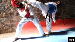 Afghanistan -- Afghan girls practice Taekwondo during a martial arts class in Herat, October 8, 2015