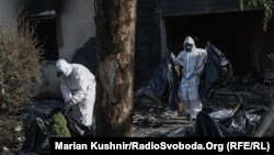 The aftermath of an ammunition detonation in the village of Myla near Kyiv, following a Russian strike.