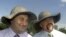 South Ossetia's Eduard Kokoity (left) and Transdniester's Igor Smirnov (wearing sun hats at an event in South Ossetia in June 2009) may no longer fit into Russia's plans for their regions.