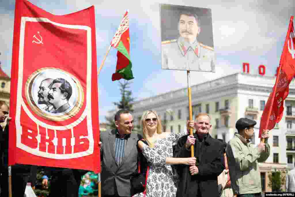 People in Minsk, Belarus, carry a portrait of Soviet leader Josef Stalin.