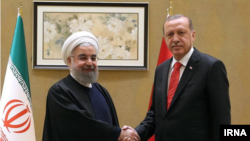 Kazakhstan-Iranian president Hassan Rouhani meets Erdogan, Turkey's president.