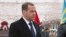 Former Russian President Dmitry Medvedev takes part in a wreath-laying ceremony at the Tomb of the Unknown Soldier on Defender of the Fatherland Day in Moscow on February 23. 