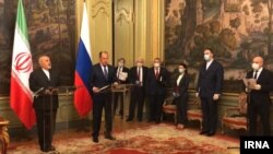 Mohammad Javad Zarif (L) of Iran in Moscow, in a joint press conference with Russian foreign minister Sergei Lavrov. 16 Jun 2020