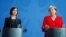 Moldovan Prime Minister Maia Sandu (left) and German Chancellor Angela Merkel attend a joint news conference at the Chancellery in Berlin on July 16.