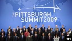 U.S. -- World leaders pose for the G20 Family Photo at the David L. Lawrence Convention Center in Pittsburgh, Pennsylvania, USA on the second day of the G20 Summit, 25Sep2009