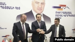 Armenia - Narek Karapetian (center) and the leaders of the New Era and United Armenians parties unveil a new opposition alliance, Yerevan, March 31, 2026.