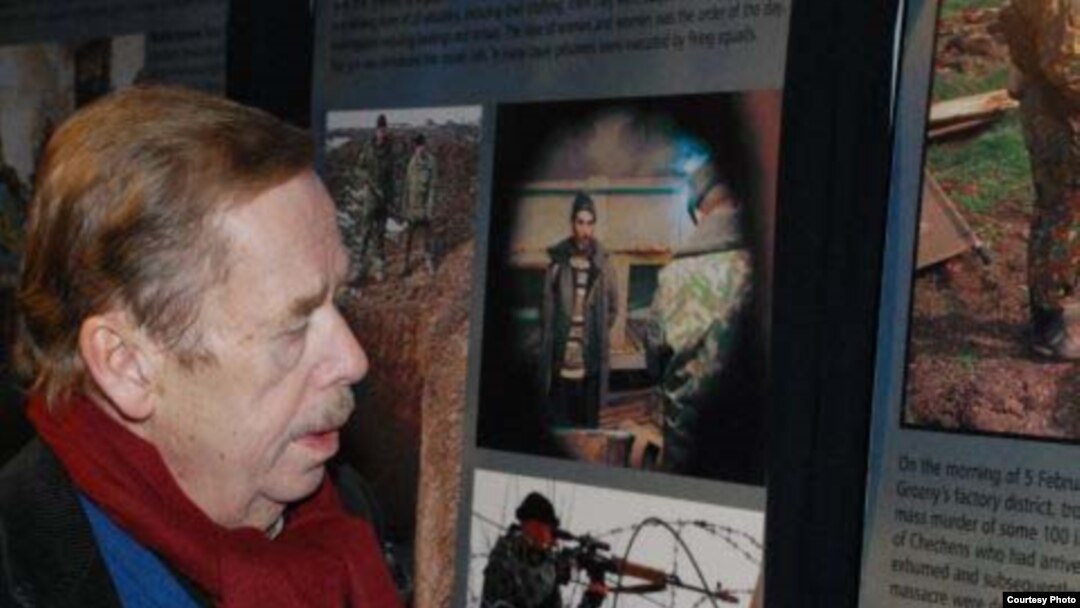The former Czechoslovak and Czech president in an undated photo at a "Chechnya: The Final Solution" photo exhibition at the library in Prague devoted to Havel, a staunch champion of human rights throughout his lifetime.