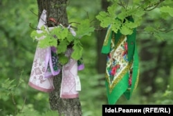 Handkerchiefs were hung from trees during the ceremony.