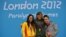 American bronze medalist Elizabeth Stone (right) joins Spanish silver medalist Sarai Gascon (left) and South African gold medalist Natalie du Toit on the podium after the women's 100-meter backstroke finals in London on August 31.