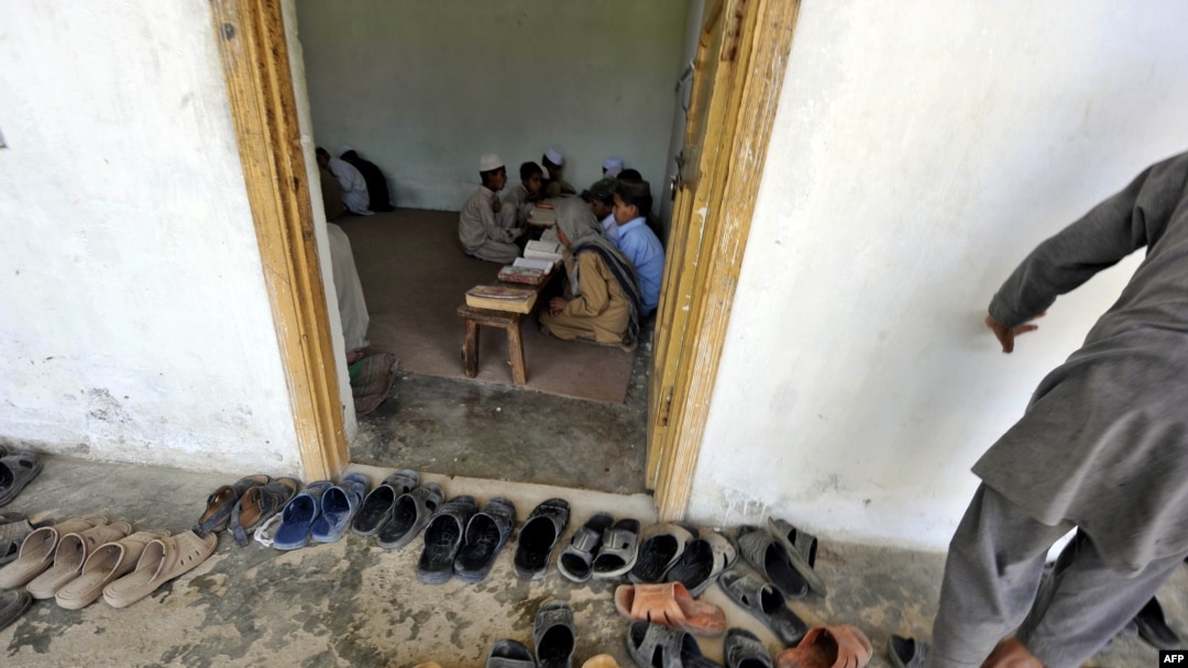 Students recite Koranic verses at an Islamic madrasah on May 10, near Abbottabad, Pakistan, where Osama bin Laden was killed on May 1-2.