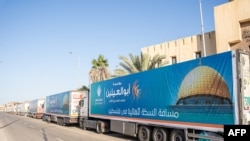 Колона вантажівок, завантажених гуманітарною допомогою для Гази, 15 жовтня 2023 року