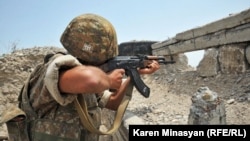 Nagorno-Karabakh -- An Armenian soldier on frontline duty near Mataghis, 20Jul2012