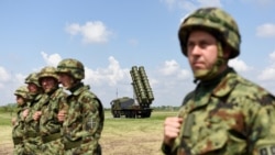 Serbian soldiers stand near a Chinese-made FK-3 medium-range missile syste during the "Shield 2022" military exercises in Batajnica, near Belgrade, in April 2022. 