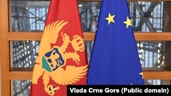 The flags of Montenegro and the European Union 