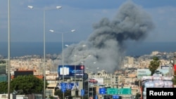 Smoke rises after an Israeli strike on Beirut's southern suburbs on March 4.