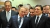 European Commission President Jose Manuel Barroso (right) welcomes Russian Prime Minister Vladimir Putin and Foreign Minister Sergei Lavrov to Brussels.