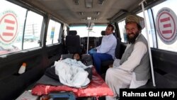 An Afghan boy injured in the fighting in Ghazni in Maidan Shar near Kabul on August 13.