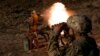 Soldiers from the Carpathian Sich volunteer battalion conduct maneuvers near the front line in Kreminna, Ukraine, on January 3.