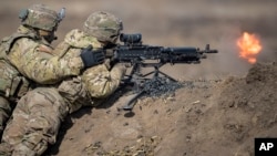 U.S. soldiers take part in the live-fire Justice Eagle 22.1 exercise at the Smardan military shooting range in Romania in March 2022.