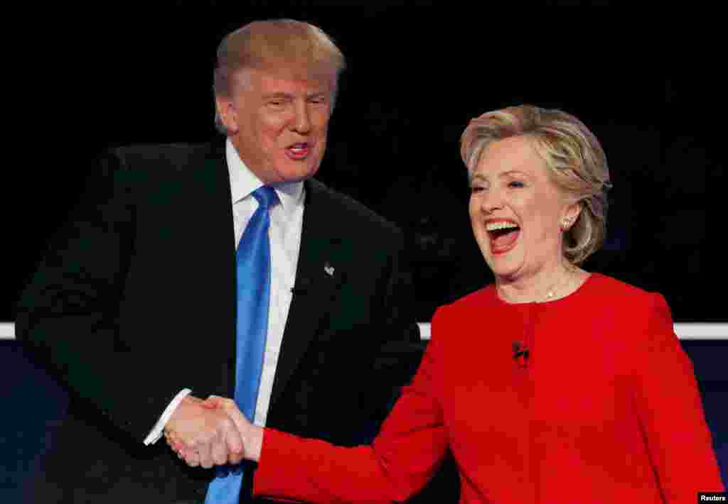 U.S. Republican presidential nominee Donald Trump (left) shakes hands with Democratic presidential nominee Hillary Clinton at the conclusion of their first presidential debate at Hofstra University in Hempstead, New York, on September 26. (Reuters/Mike Segar)