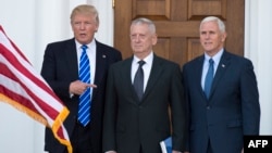 President-elect Doanld Trump poses for a photo with retired U.S. Marine General James Mattis (center) and Vice President-elect Mike Pence on the steps of the clubhouse at Trump National Golf Club in Bedminster, New Jersey, on November 19.