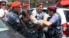 Armenia - Police detain a protester during a demonstration against traffic fines in Yerevan, 19Jun2014.