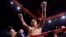 Oleksandr Usyk celebrates winning his fight against Daniel Dubois in London on July 19. 