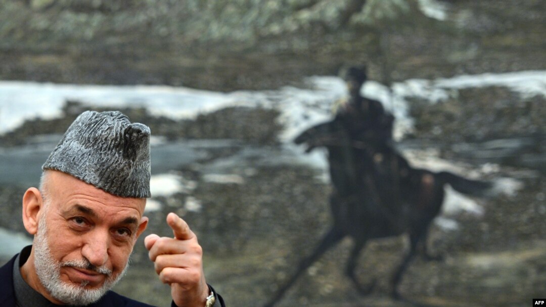 Afghanistan -- President Hamid Karzai addresses a press conference at the Presidential Palace in Kabul, November 16, 2013
