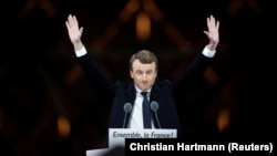 Emmanuel Macron celebrates winning the French presidency at a rally near the Louvre in Paris on May 7. 