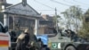 Pakistani soldiers outside an Agriculture Training Institute after an attack by Taliban militants in Peshawar on December 1.