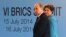 Brazilian President Dilma Rousseff (right) walks with Russian President Vladimir Putin before the sixth BRICS summit in Fortaleza, Brazil, on July 15.
