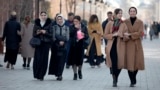 Women walk through a street in the Chechen capital, Grozny. In the past month, the republic's authorities have issued several new restrictions on women's clothing. 