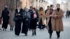 Women walk on a street in the Chechen capital, Grozny. Human rights activists have long accused the North Caucasus region of trampling on the rights of women and minorities. 