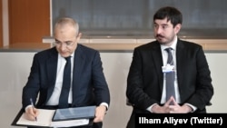 Гейдар Алиев-младший (справа)