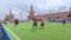 Refugees Play Football On Red Square