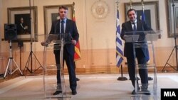 Градоначалникот на Атина Јоргос Каминис т градоначалникот на Скопје Петре Шилегов 