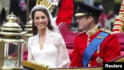 Britain's Prince William and his wife Catherine after their wedding ceremony -- Tajikistan's president says such a lavish ceremony in the east would draw accusations of totalitarianism.