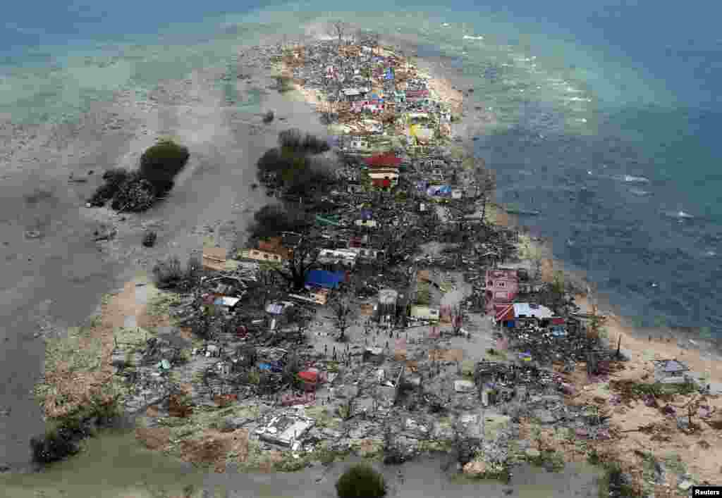 An aerial view shows a coastal town devastated by super Typhoon Haiyan, in Samar province in central Philippines. (Reuters/Erik De Castro)