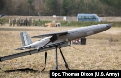 A Hornet attack drone on its launch catapult during a demonstration in Germany in March