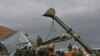 Kosovo -- German KFOR soldiers emove barbed wire from the road in the village of Jagnjenica, 05Dec2011