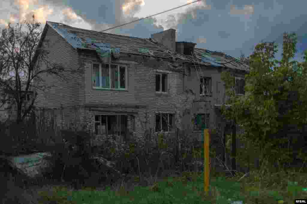 A building in a once middle-class&nbsp;part of Maryinka, which was previously occupied by the separatists, now sits empty. Inside is an unexploded artillery shell that soldiers fear could&nbsp;detonate if they enter.