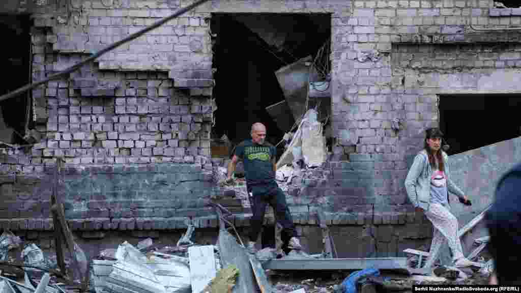 Other people, like Natalya, were seen trying salvage anything they could from the badly damaged five-story building.“I was climbing around there, trying to find at least something -- some documents, some basic things that might have survived,” she said.