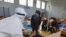 Doctors in Issyk-Kul, Kyrgyzstan, treat suspected patients with COVID-19 on July 16.