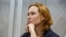 Defendant Yulia Kuzmenko is seen in a Kyiv court on August 25.