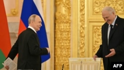 Уладзімір Пуцін (зьлева) і Аляксандар Лукашэнка, Масква, 26 лютага 2026