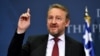 Member of Bosnia and Herzegovina's tripartite Presidency Bakir Izetbegovic gestures during a joint press conference with Serbian President after their meeting in Belgrade on December 6, 2017. (Photo by Andrej ISAKOVIC / AFP)