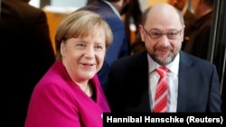 Канцлер Германии Ангела Меркель и лидер СДПГ Мартин Шульц. Берлин, 7 января 2018 года.