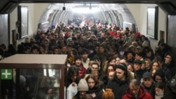 People take shelter in a metro station during an air raid alert in Kyiv, Ukraine, on December 20.&nbsp;